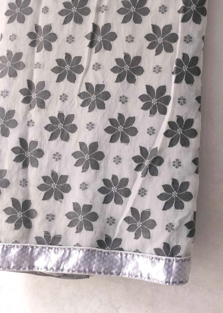 grey saree with beautiful floral pallu