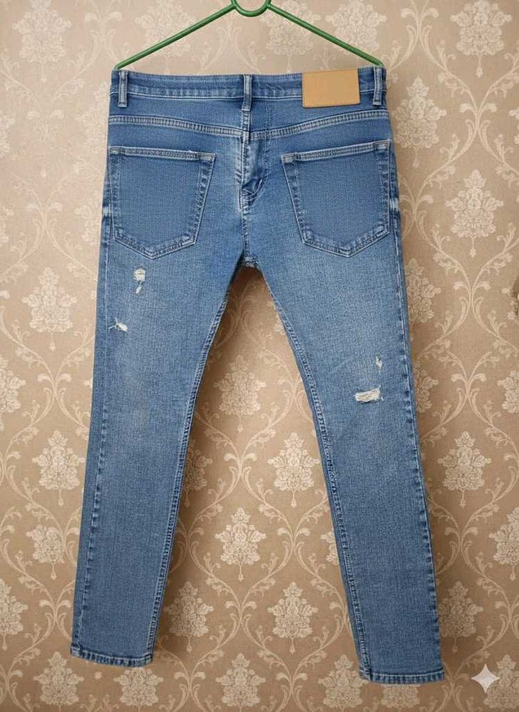 Distressed Denim Jeans