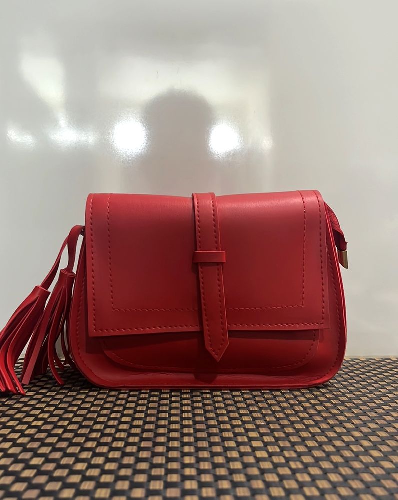 Red Sling Bag With Tassel Detailing