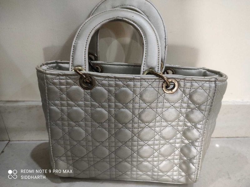 Stylish silver hand bag