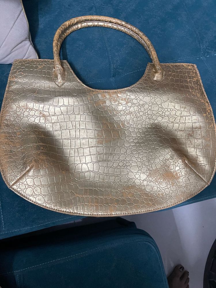 Golden party wear handbag