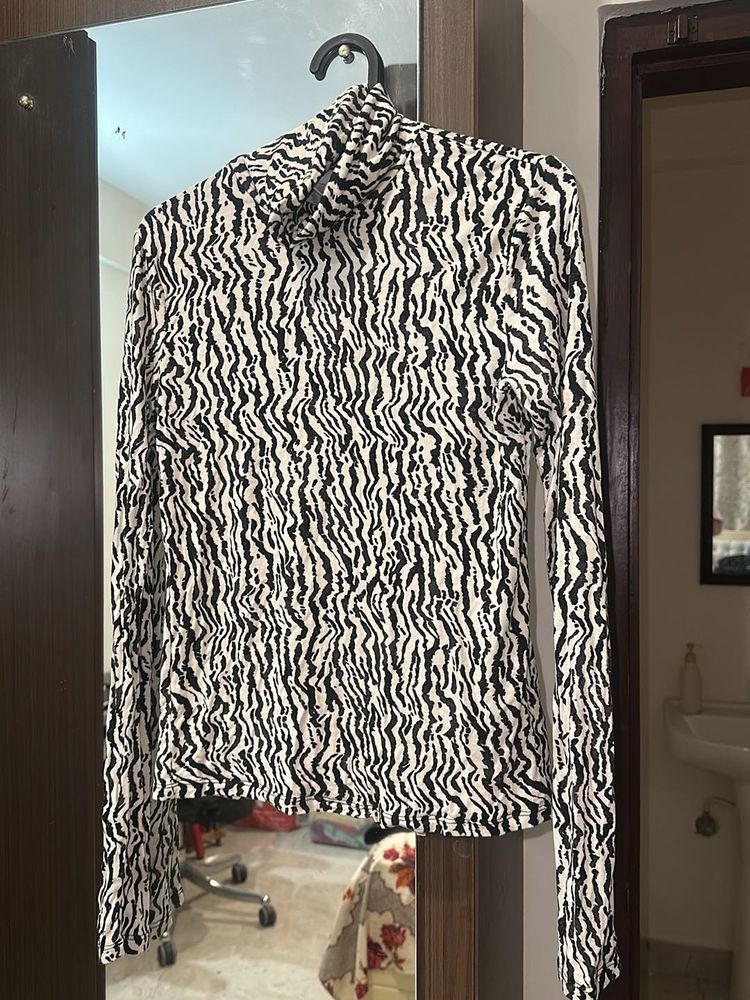 Zebra Print Turtleneck Top