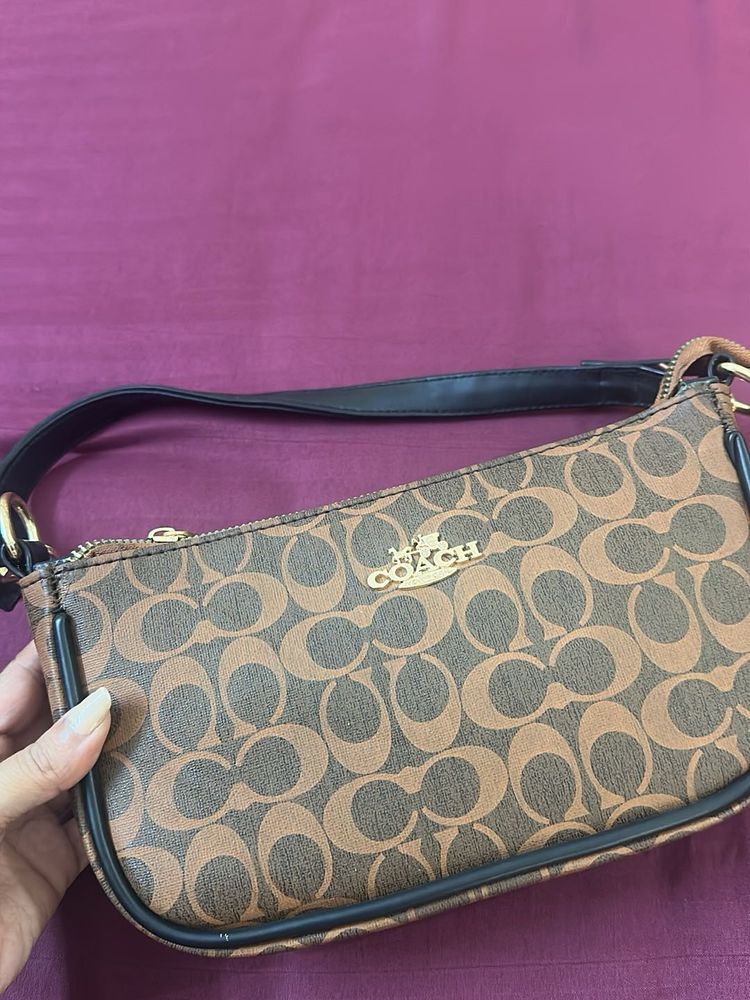 Coach Clutch sling Bag