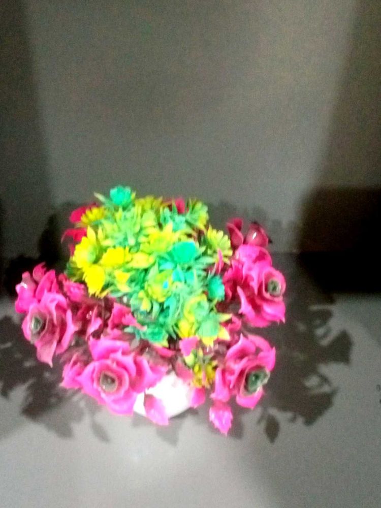 Floral arrangement with pink roses