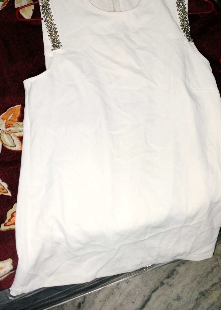 White Sleeveless Top