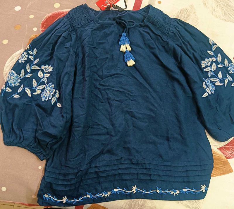 Blue Top With Tag