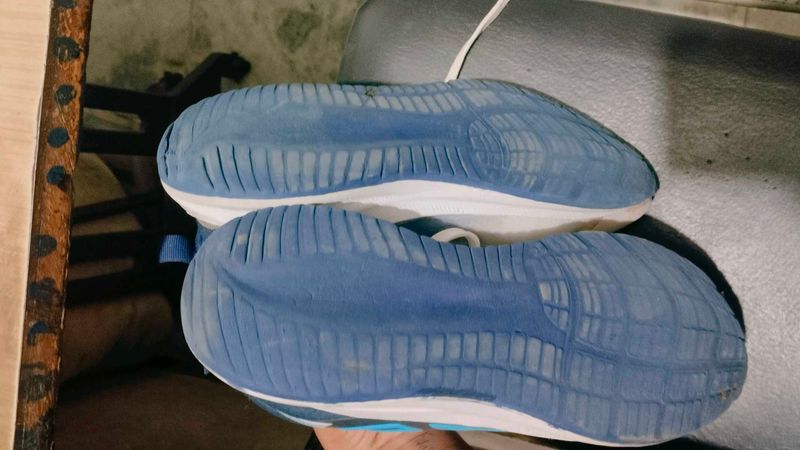 Used Blue Running Shoes