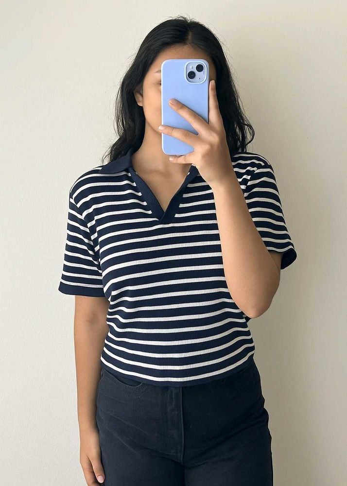 Stripes never go out of style Grab this classy pol