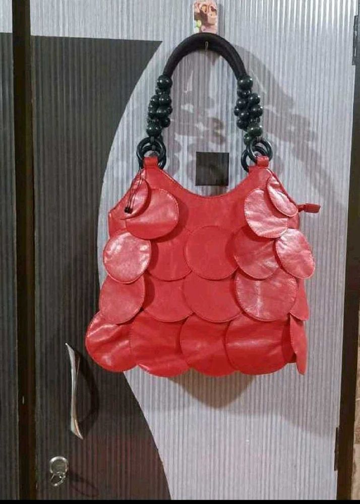 Red Handbag with Unique Design