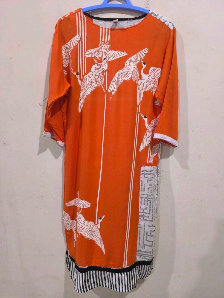 Oraange Boat Neck Kurti.