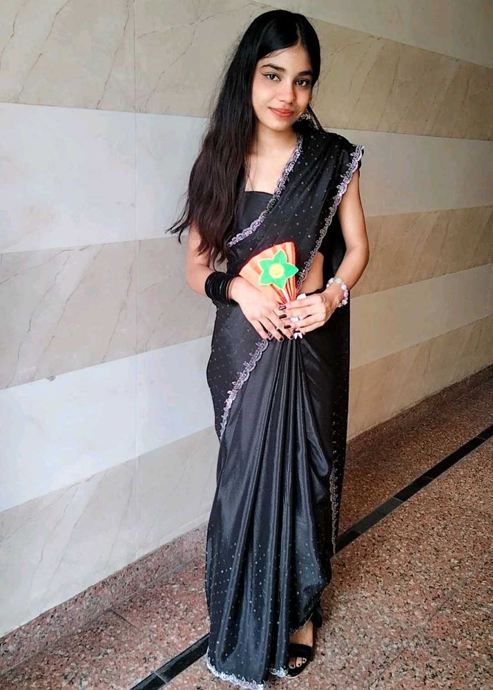 Elegant Black Saree with Silver Detail