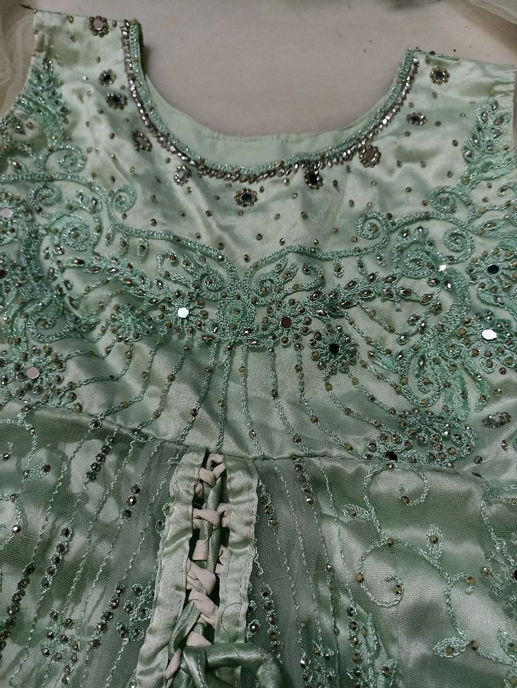 Embroidered mint green dress