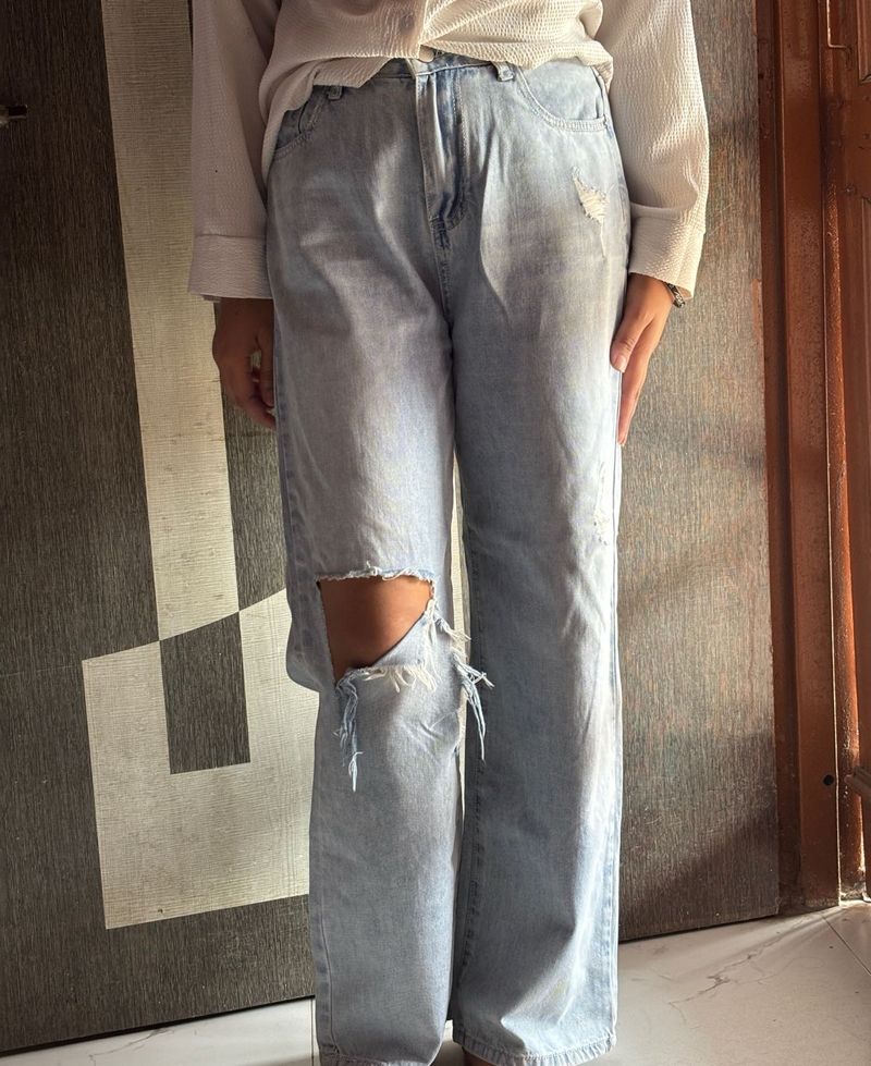 Ripped Knee Jeans