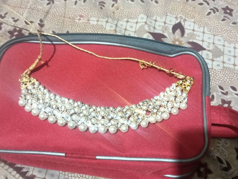 Choker cum necklace with pearls and diamonds
