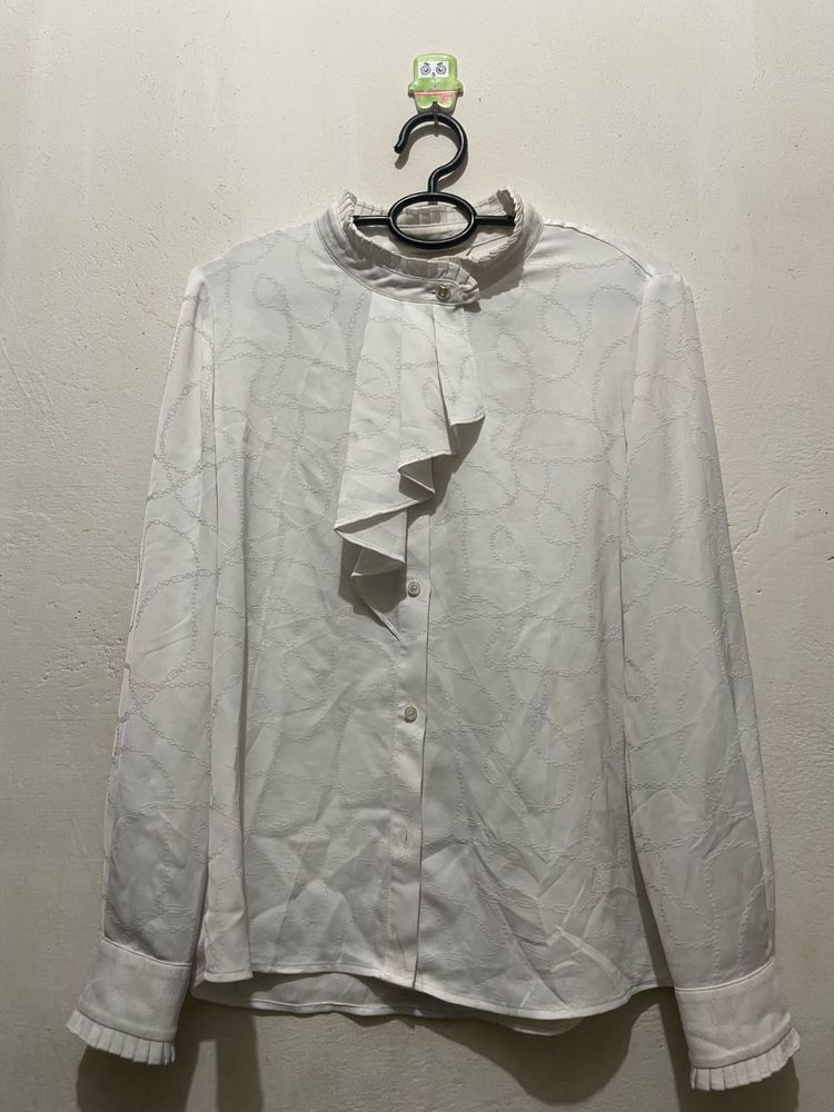 Elegant White Ruffled Blouse