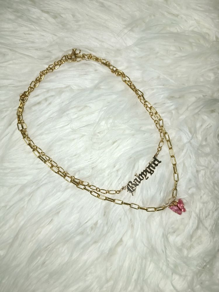 2 Layered golden pendant with butterfly charm