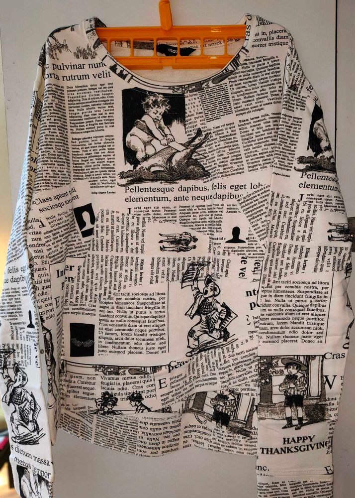 Viral Newspaper Print Pullover Top