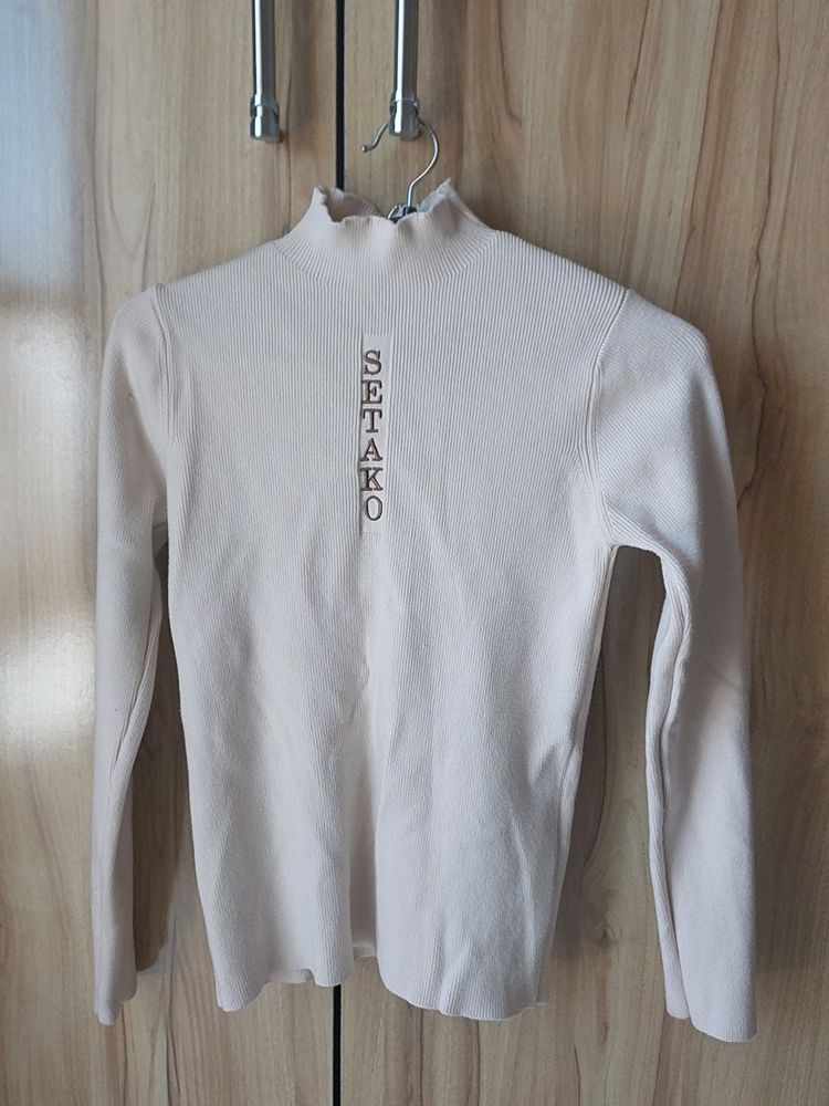 Cute Beige High Necl Top With Ruffle Nect Detail