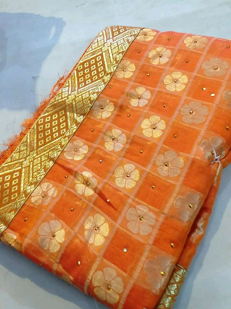 Organe Colour Saareee.                                     Fully Laced Saaree Blouse Attach Within.                            No coins/No Swap