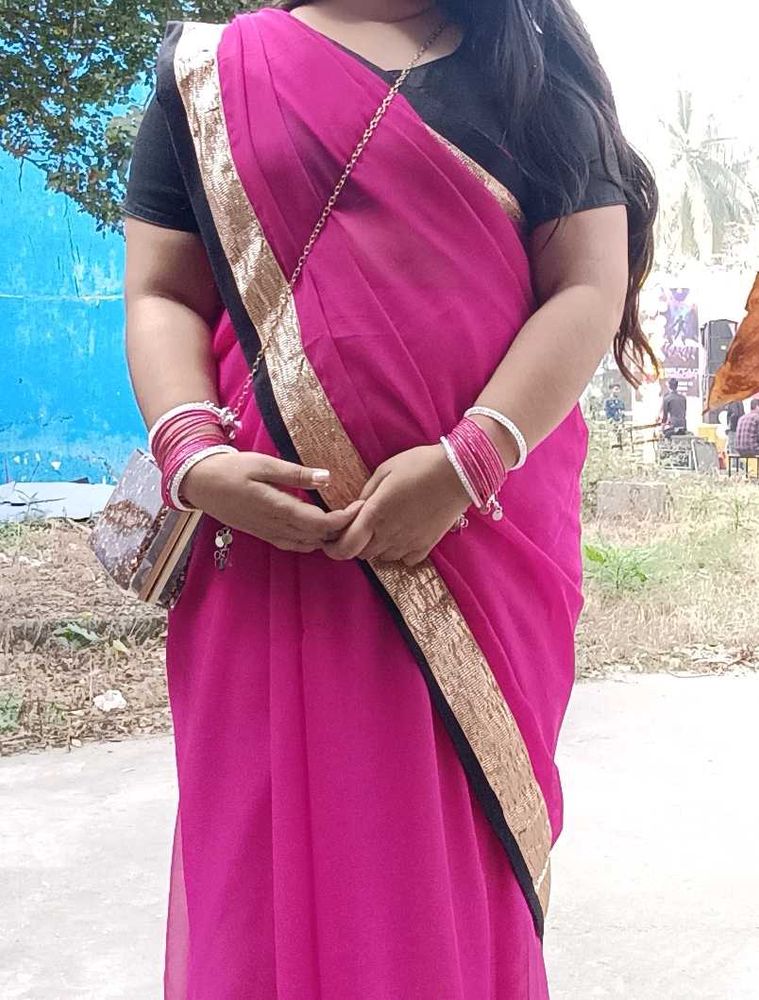 Elegant Pink Saree with Gold Border