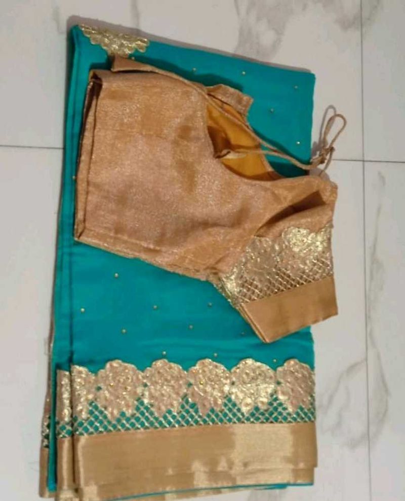 Teal Saree with Gold Embellishments