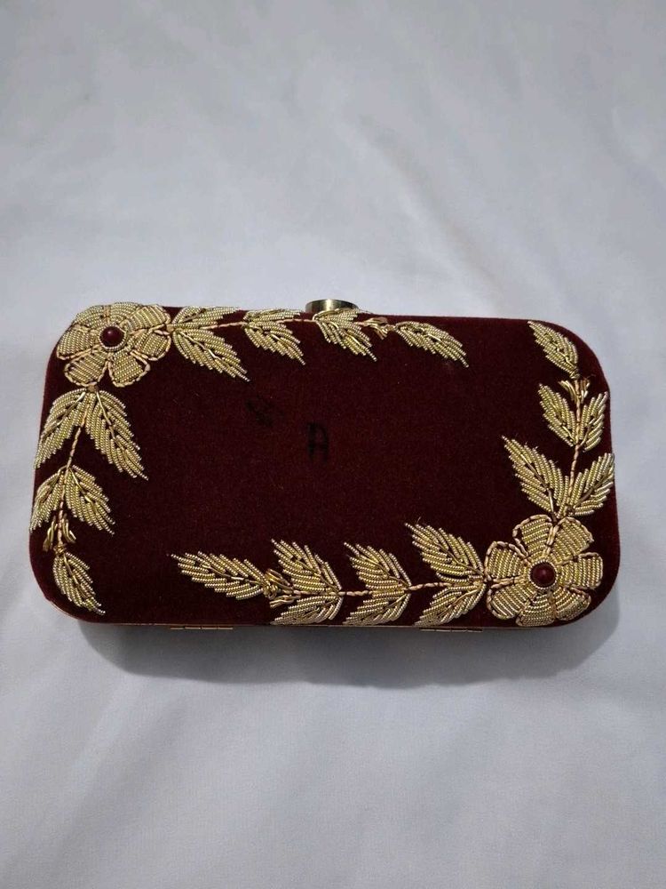 Elegant Maroon Clutch