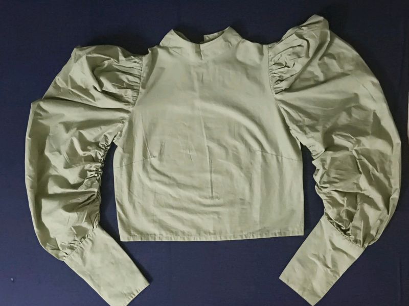 Bell hands green top