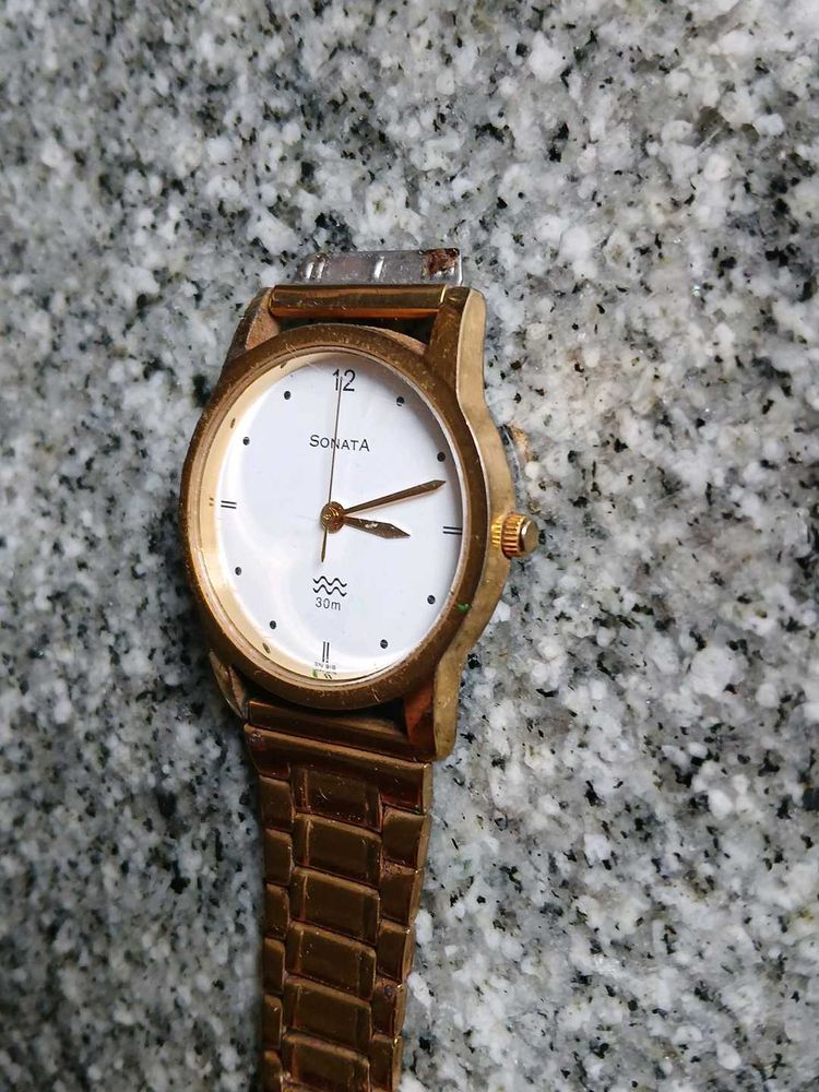 Sonata Gold Watch