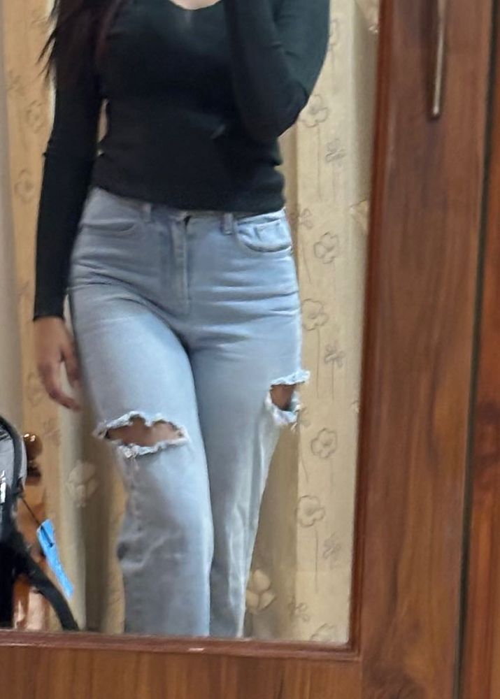 Ripped Light Wash Denim Jeans