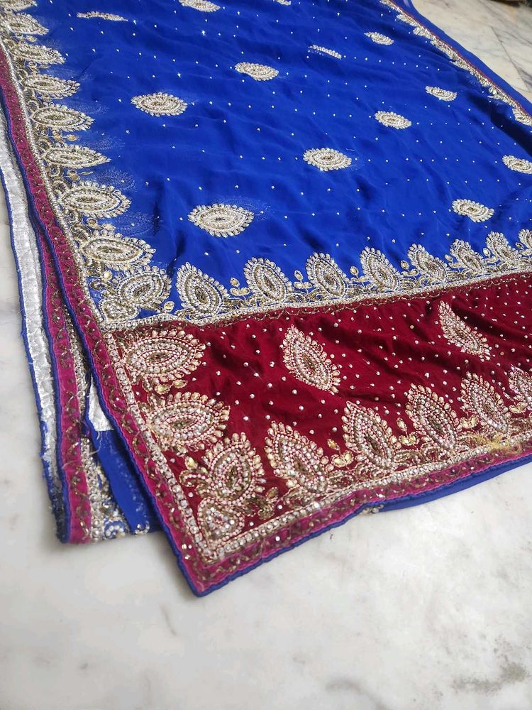 pink velvet border blue Dimond stone work saree