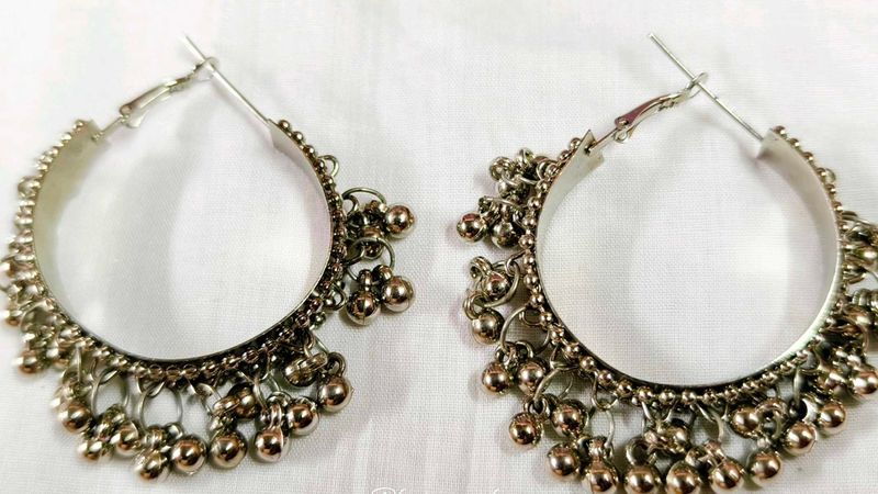 Oplera  spark  trending earrings Alloy