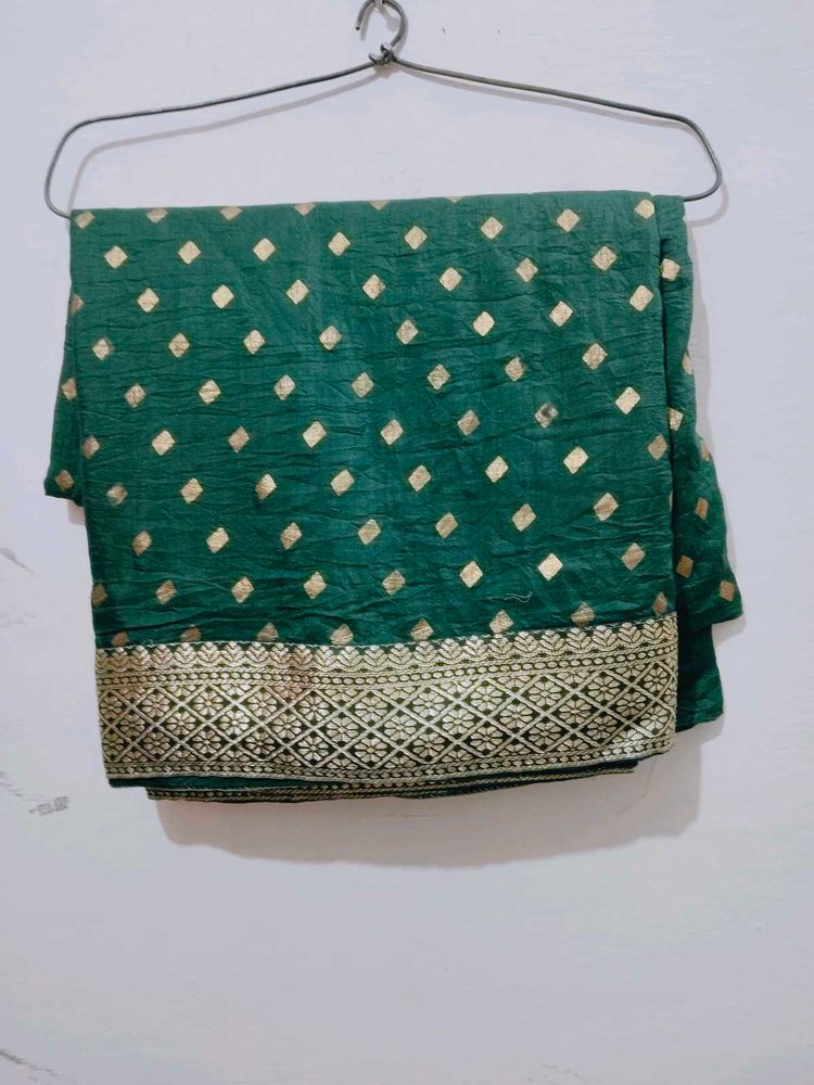 Green Saree with Gold Accents