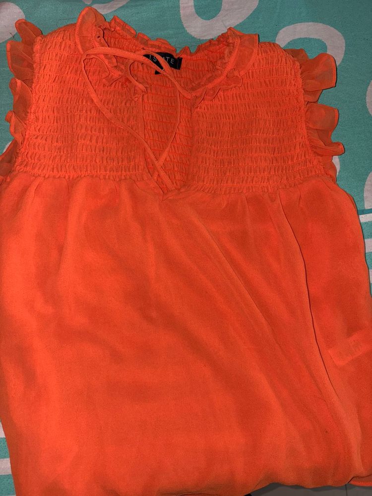Orange Smocked Ruffle Tank