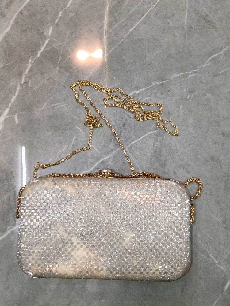 Elegant Silver Clutch with Chain Strap