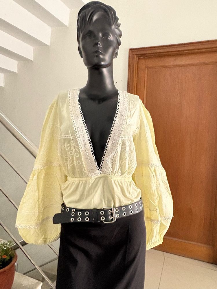 Yellow long sleeve bodysuit