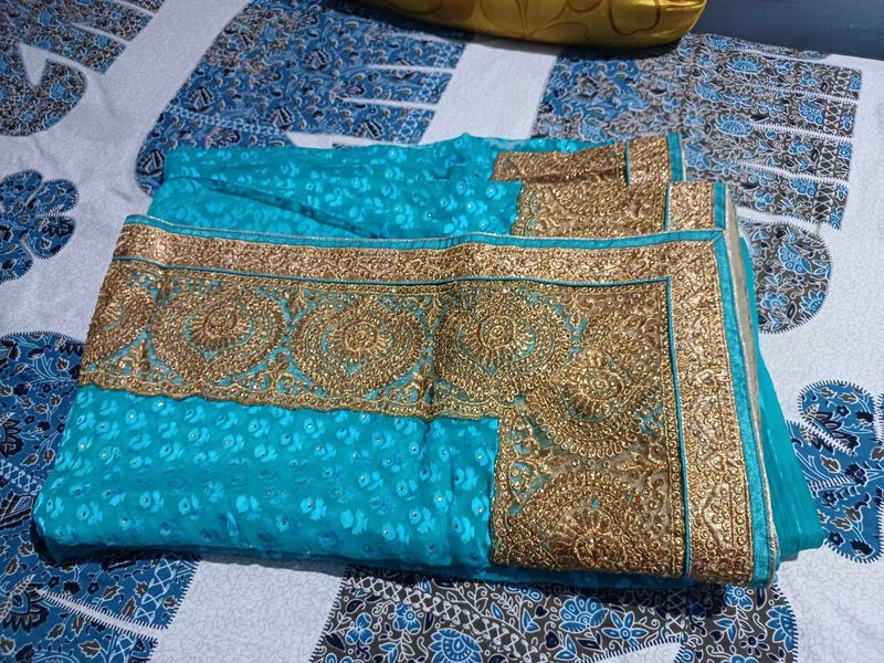 Teal Saree with Gold Embroidery