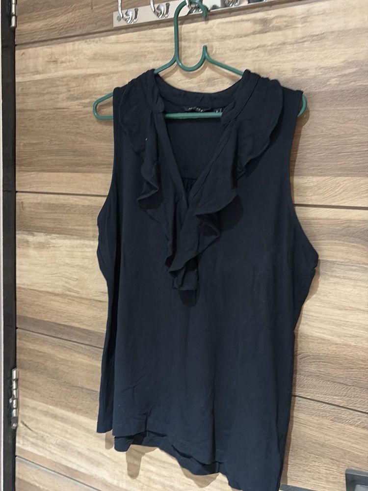 Elegant Ruffled Sleeveless Top