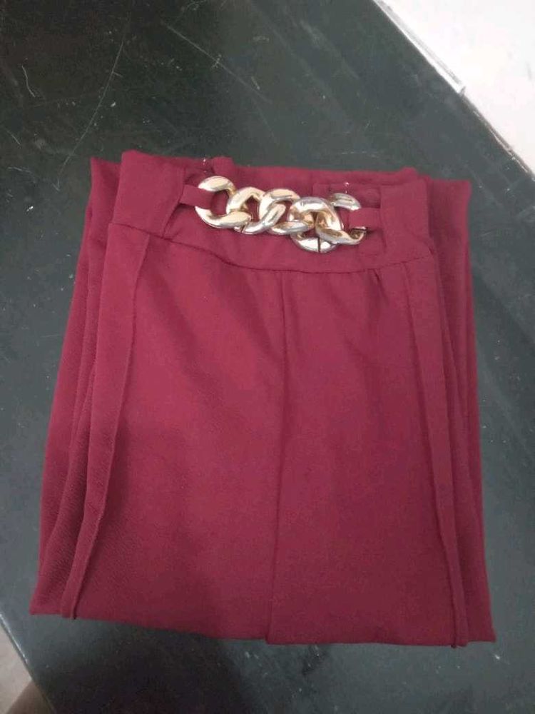 Maroon Wide-Leg Pants with Gold Chain Accent