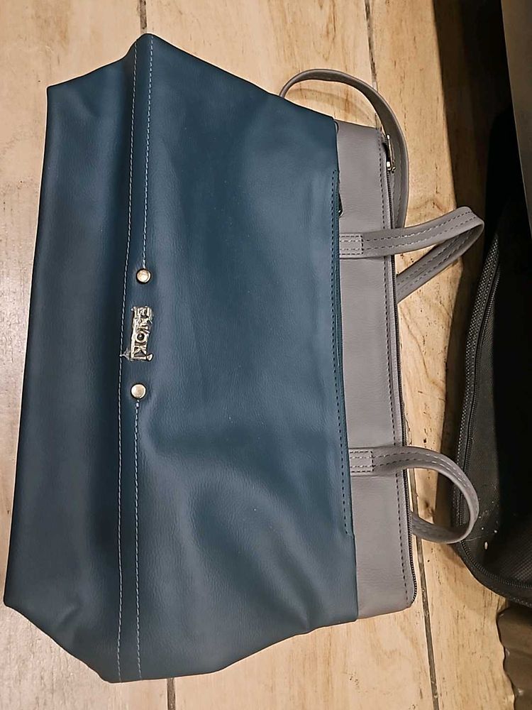 Enoki Brand New 4 Zipper Bag Never Used