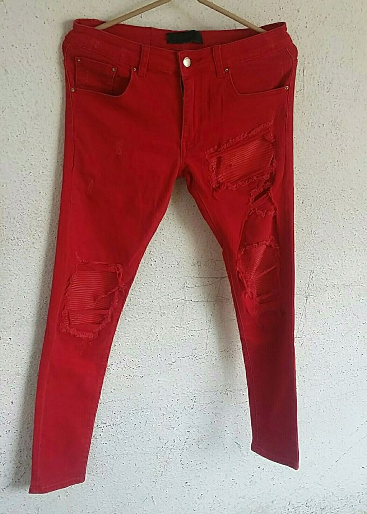AMIRI Red Cotton Stretch MX1 Leather Patch Jeans From AMIRI.