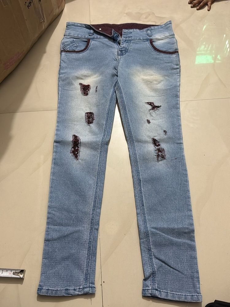 Ripped Light Wash Jeans