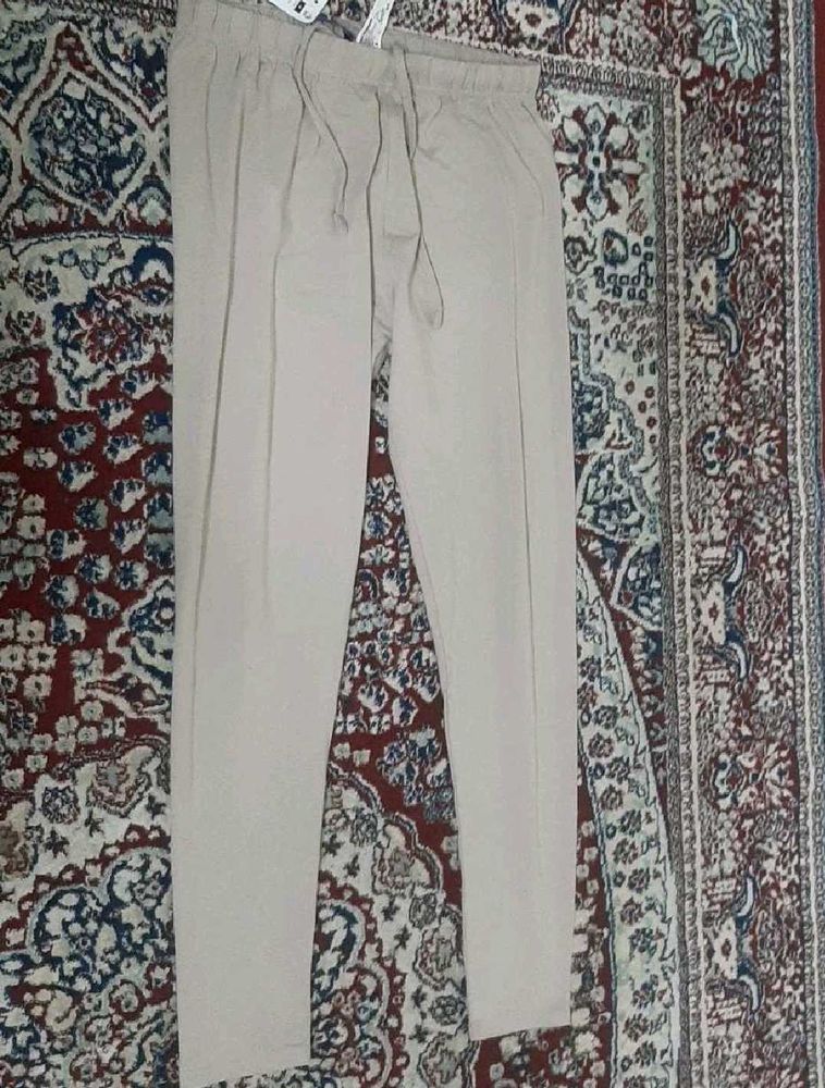 latte color leggine, size M, 69 cm