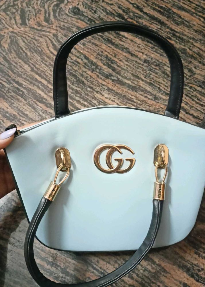 GG Blue Scatch Sling Bag.
