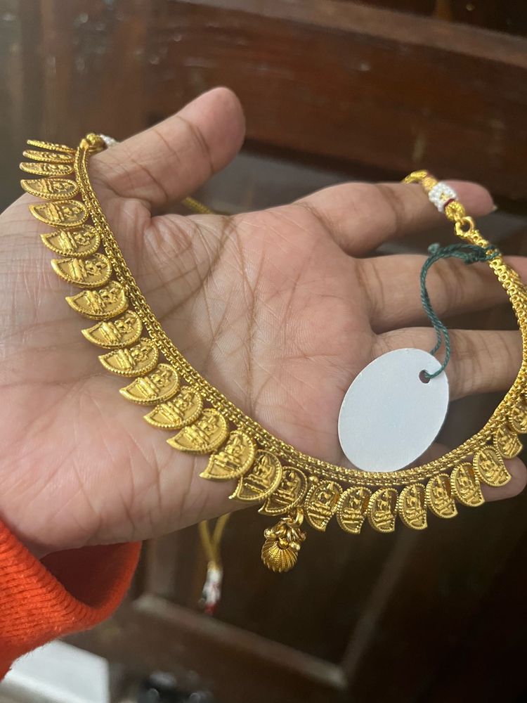 Gold-toned Godess carving Necklace