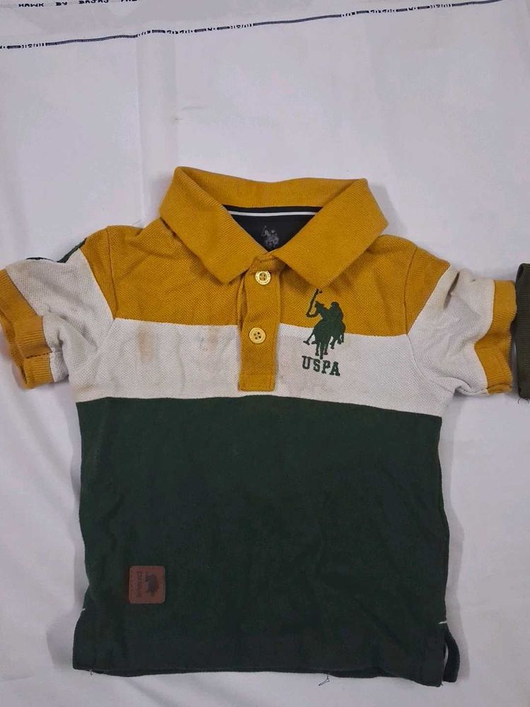 USPA Kids Polo T-Shirt.stain will go away.