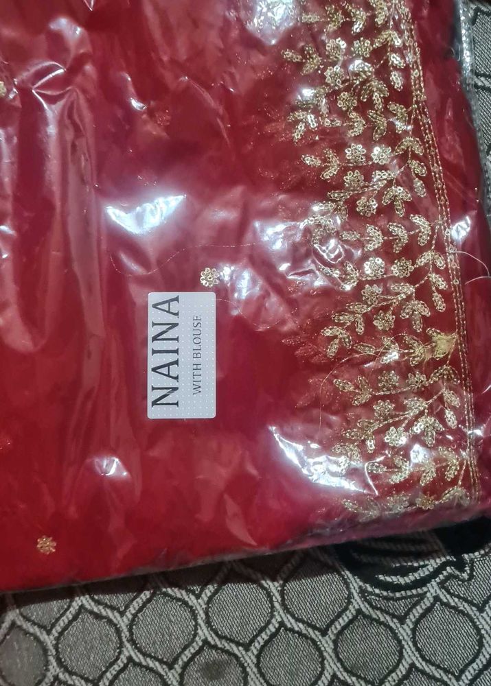 Elegant Red Saree with Gold Embroidery
