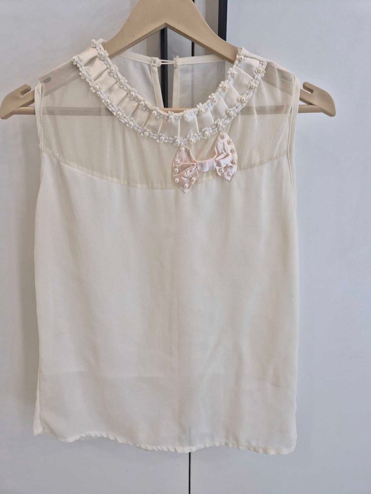 Sleeveless Cream Top