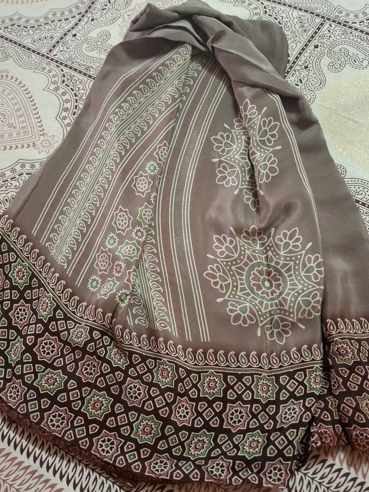 Elegant modal silk saree with blouse piece