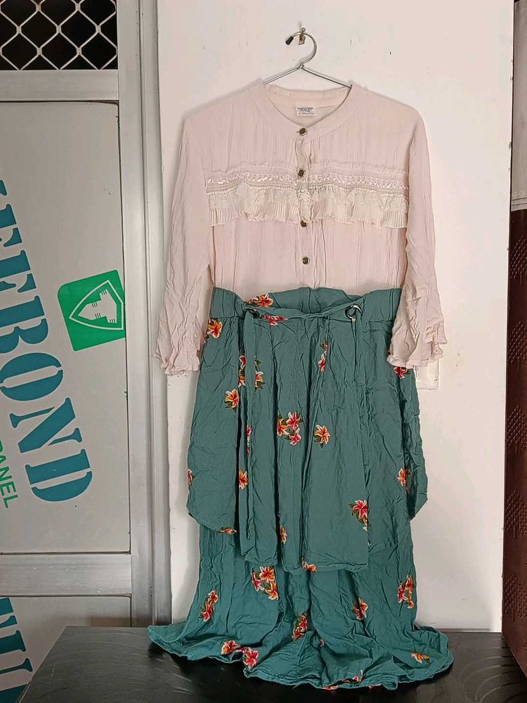 This Is A Flared Dress With Lily Print On It