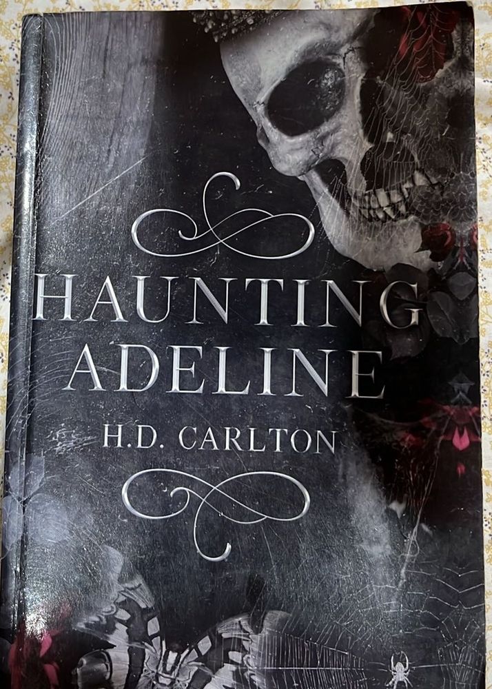 HAUNTING ADELINE BY H.D. CARLTON